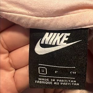 I am selling  a light pink Nike jacket, it is in good condition